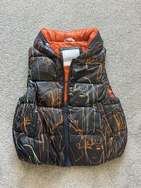 Quilted Black Vest with Orange Lined Interior